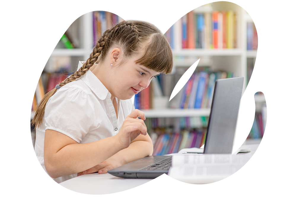 Student sitting in front of a laptop